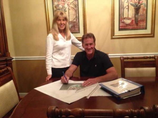 CONTRIBUTED (from left) Kathy Hiester (standing) and her husband Shawn Hiester of Marine Conservation Partners in St. Augustine are moving forward to develop a 250,000 gallon public aquarium plus a botanical garden and aviary project at Riberia Point in St. Augustine. Among the marine animals planned for the aquarium will be a sand tiger shark.